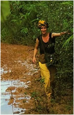 Helena wading through Jungle in Madagascar
